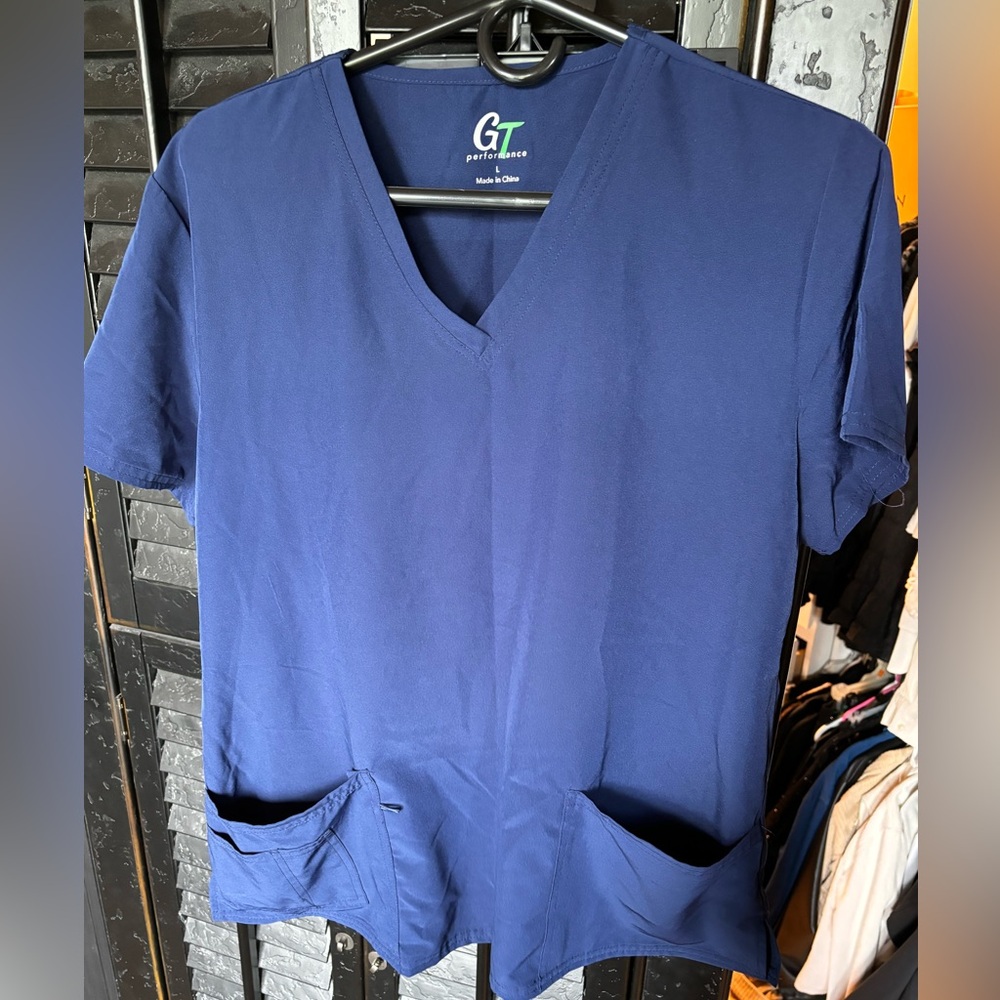 Blue scrubs. Size large worn once